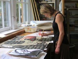 Anna Pidgorna working on a piece of art, to accompany a score. Photo by M. Teresa Simao.